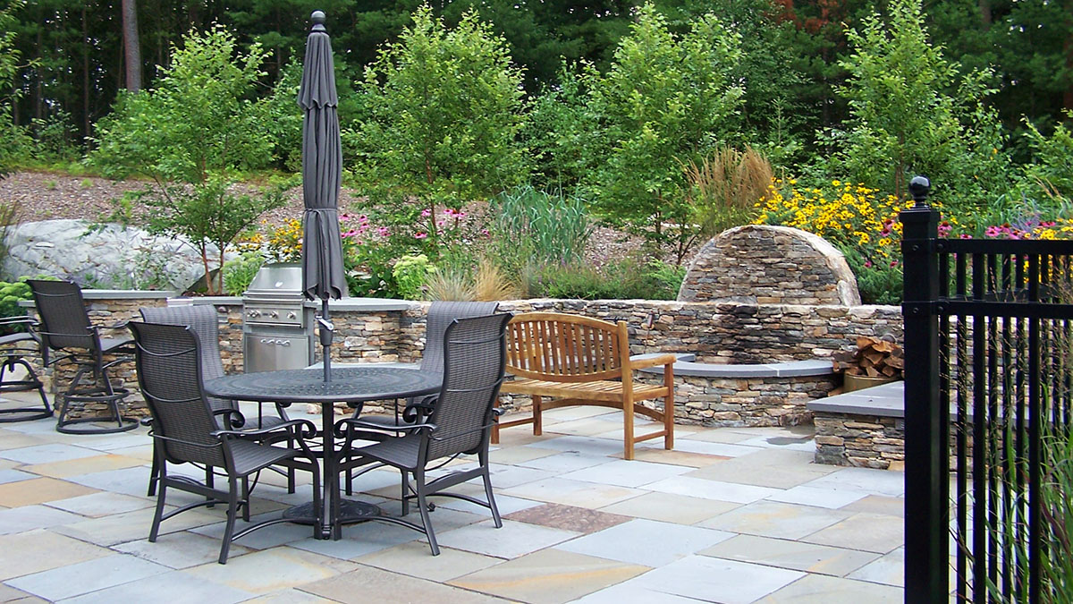 A Large Bluestone Patio Expands This Family's Living Space