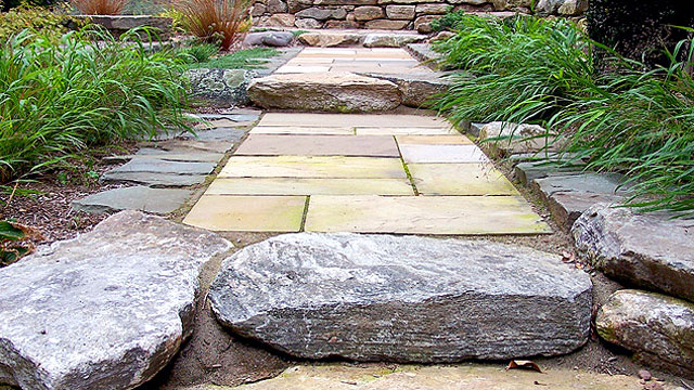 A Simple Line Of Japanese Forest Grass Softens The Edge Of The Stonework