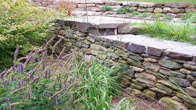 New England Fieldstone Retaining Wall With Quarried Bluestone Cap