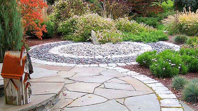 A Stone Sculpture Provides Year-Round Interest