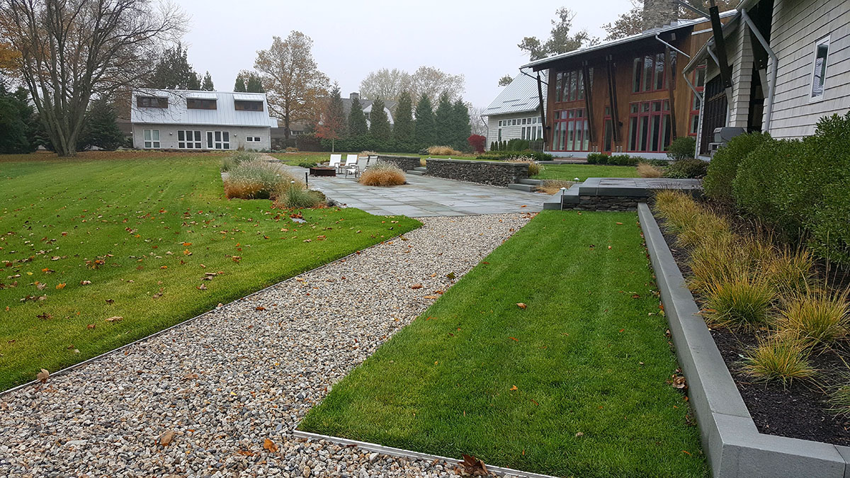 Crushed Stone Paths Connect the Guest and Pool House to the Main Residence