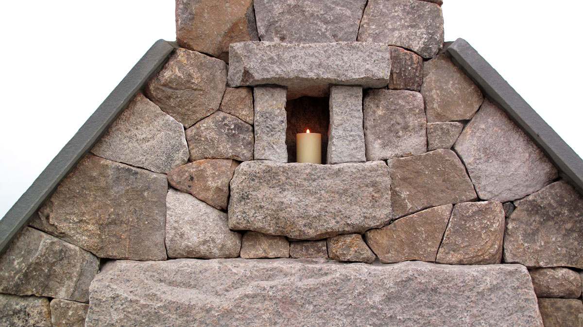 New England Fieldstone and Salvaged Granite Fireplace